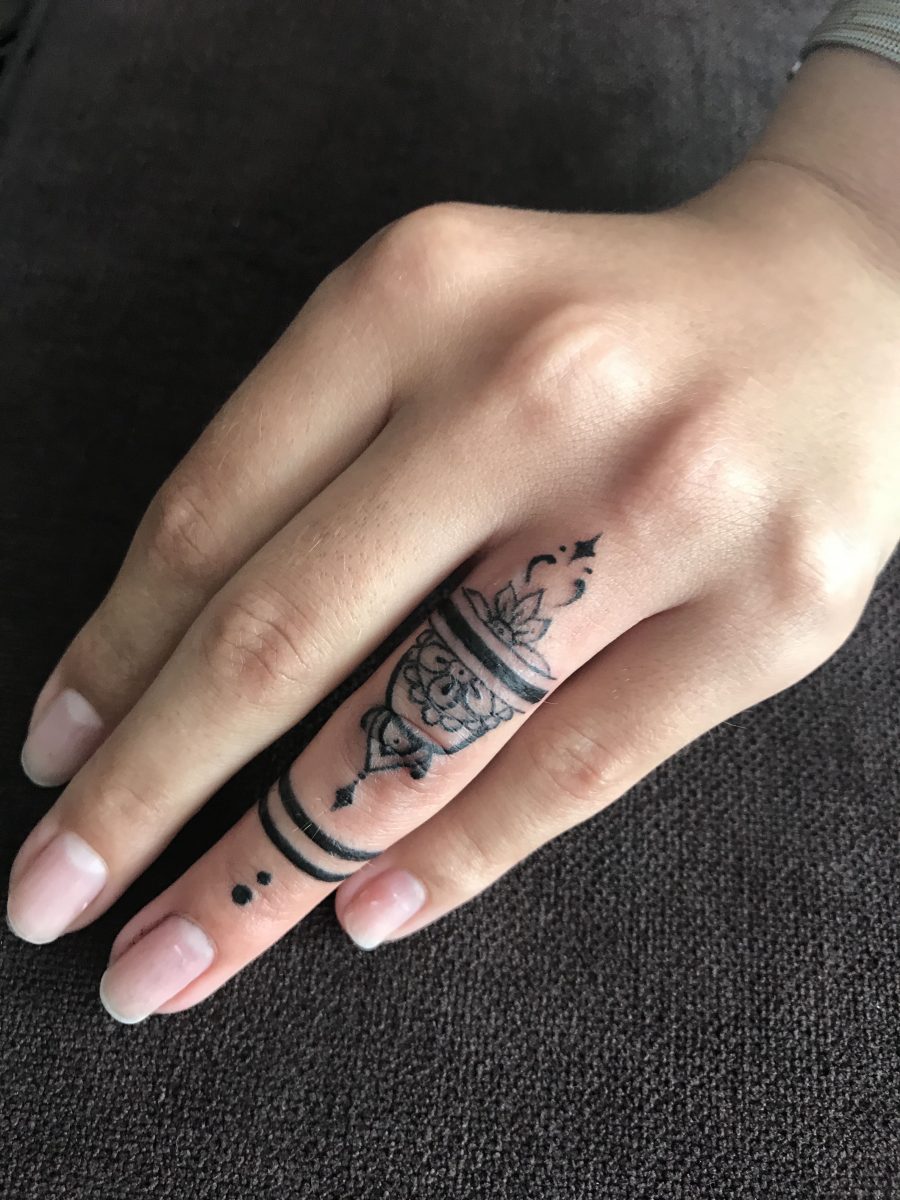 Black work tattoo Line tattoo Tattoo on the finger