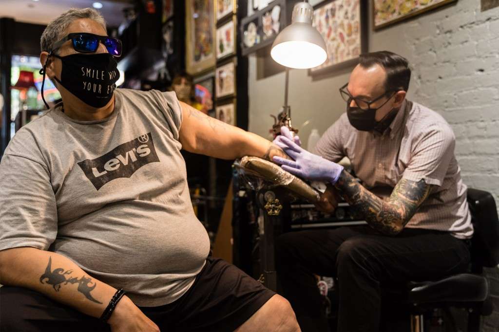 Customers flood NYC tattoo parlors after Phase 3 reopening