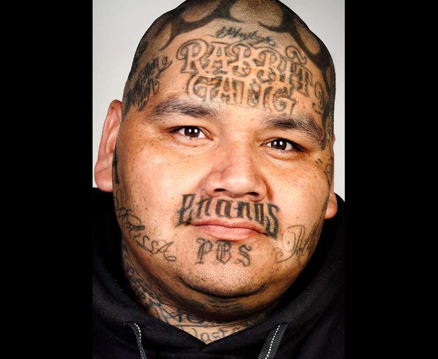 Ex gang members get tattoos digitally removed