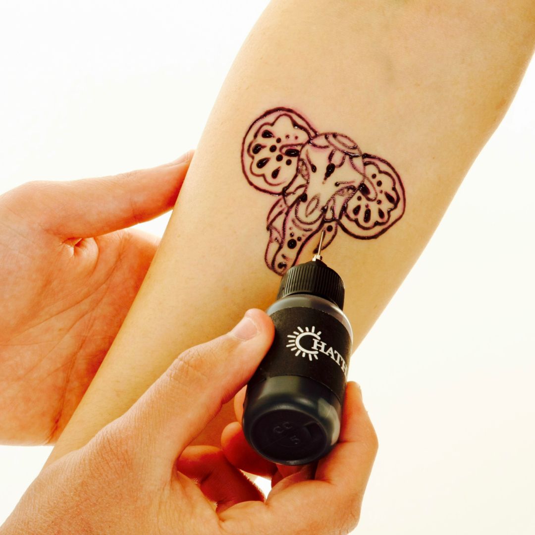 Temporary tattoo kit that lasts up to 2 weeks. Trace our stencil ...
